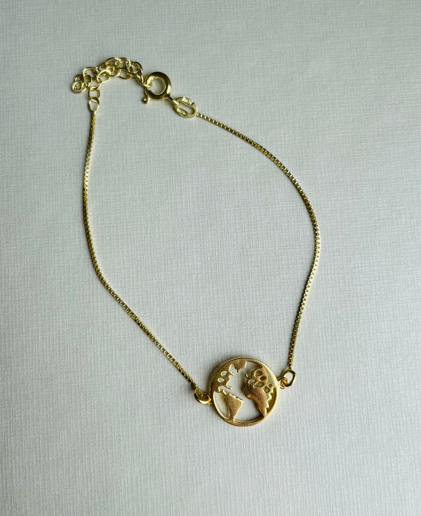 Bracelet in sterling silver and gold bath, WORLD MAP.